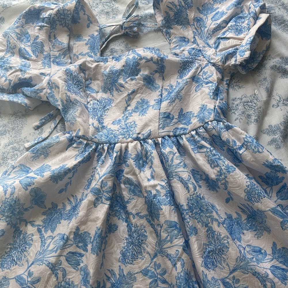 blue and white patterned dress